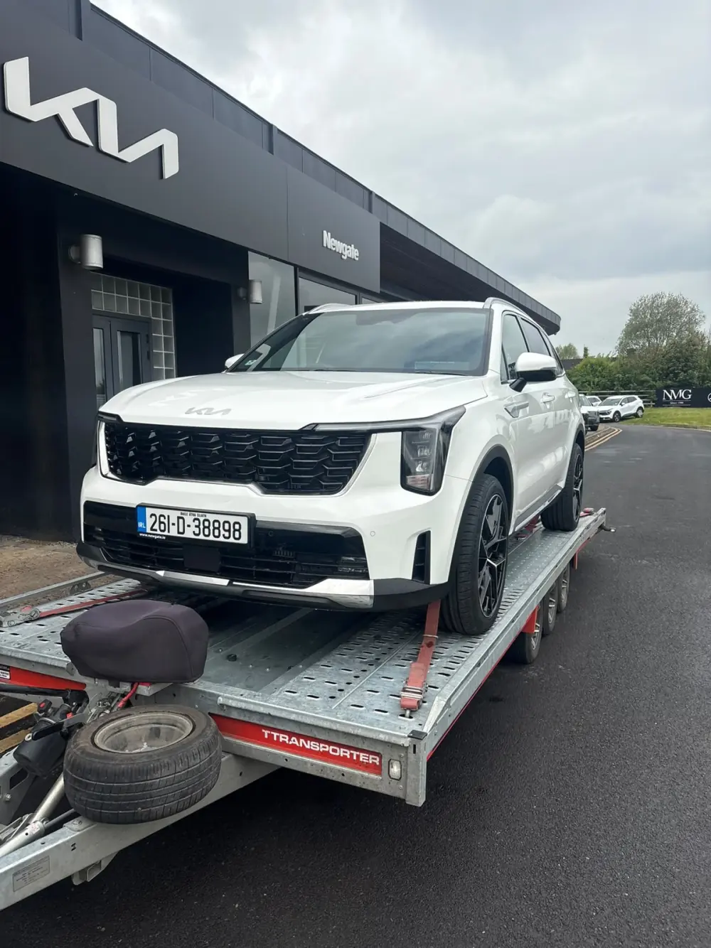 Large SUV secured on the Healy vehicle transporter